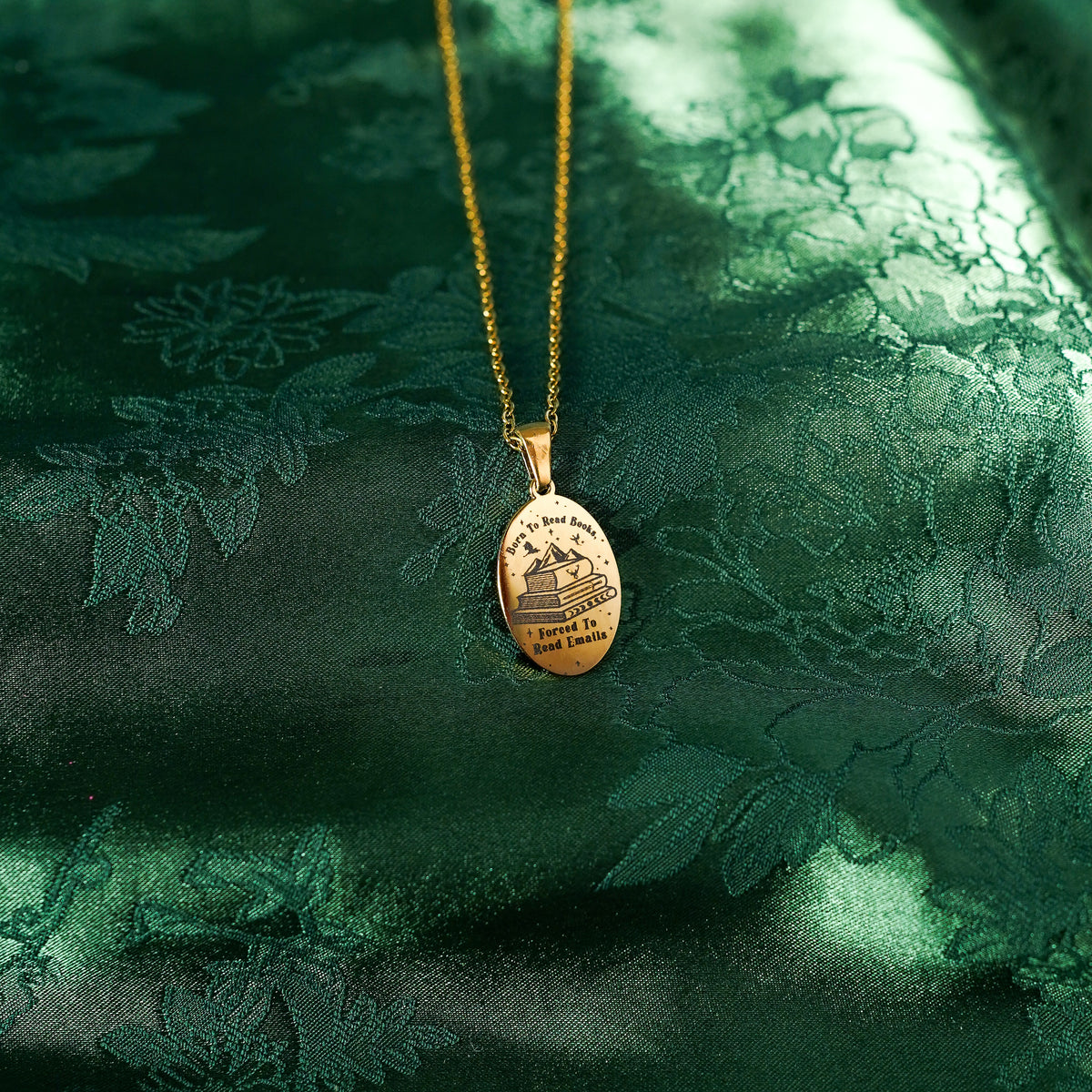 The "Born To Read Books, Forced To Read Emails" Oval Necklace