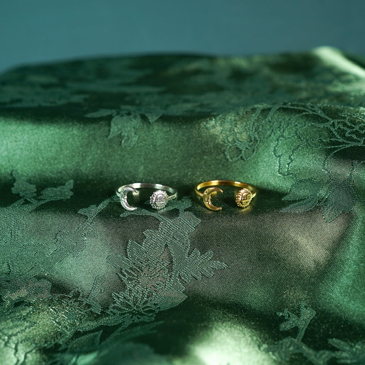 Adjustable ring with sun and moon design