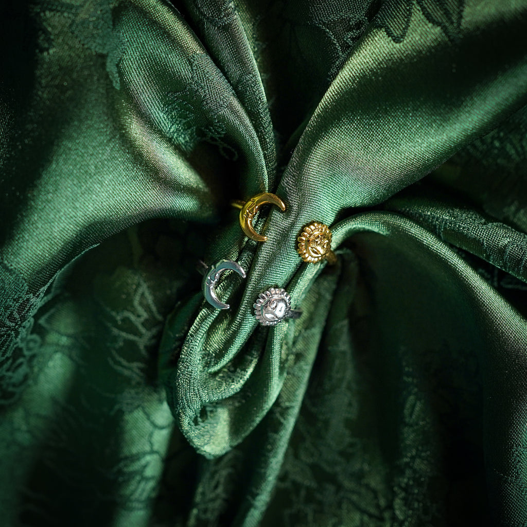 Adjustable ring with sun and moon design on silk