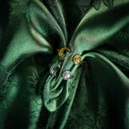 Adjustable ring with sun and moon design on silk