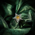 Chunky adjustable star ring close up