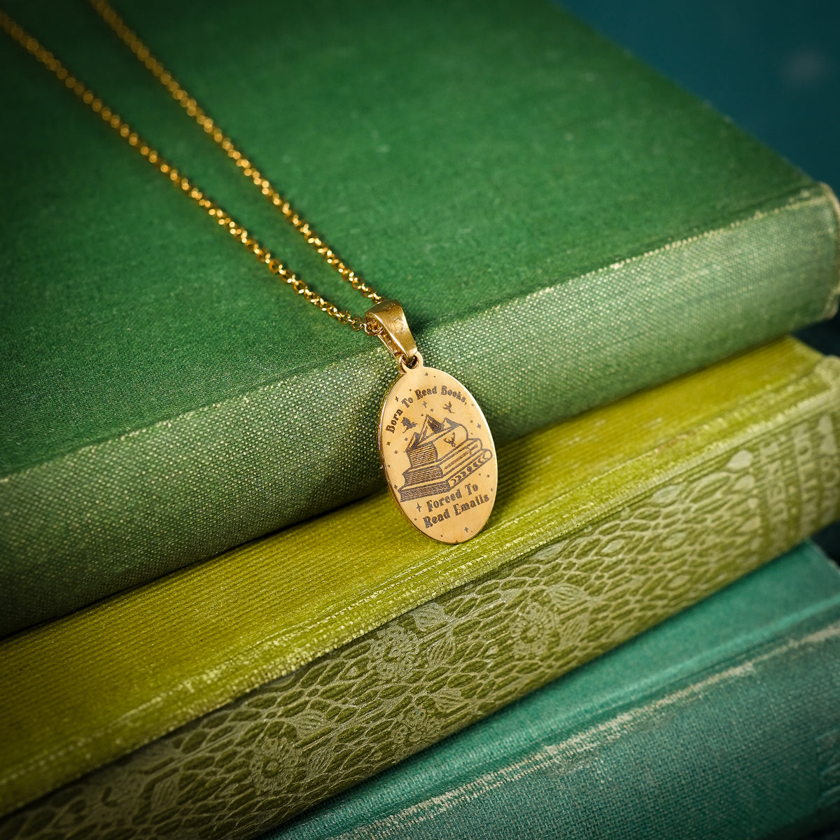 The "Born To Read Books, Forced To Read Emails" Oval Necklace