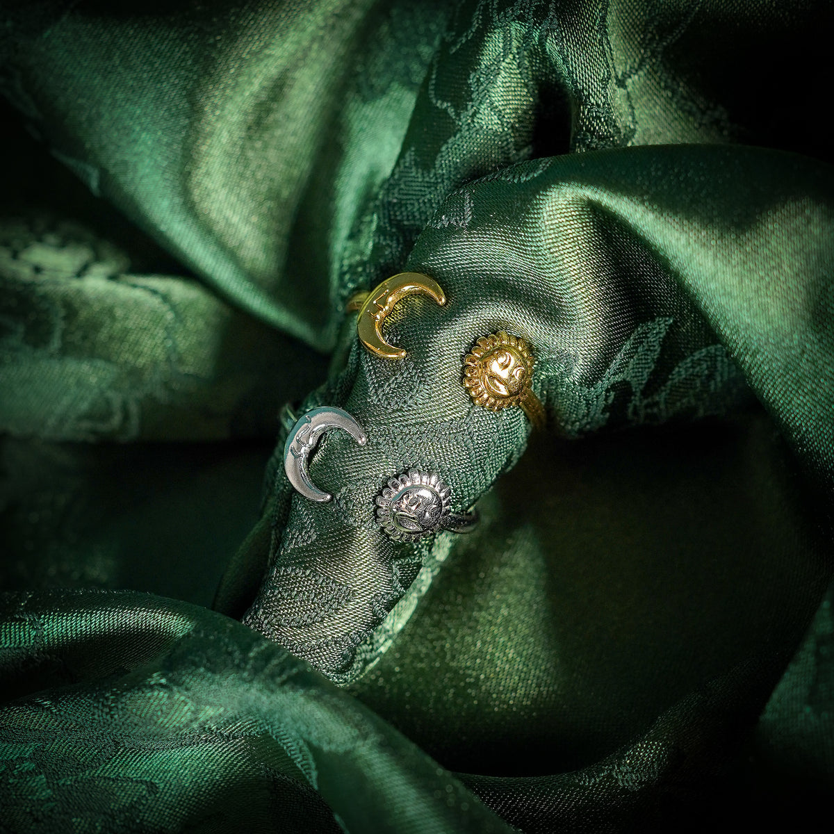 Adjustable ring with sun and moon design